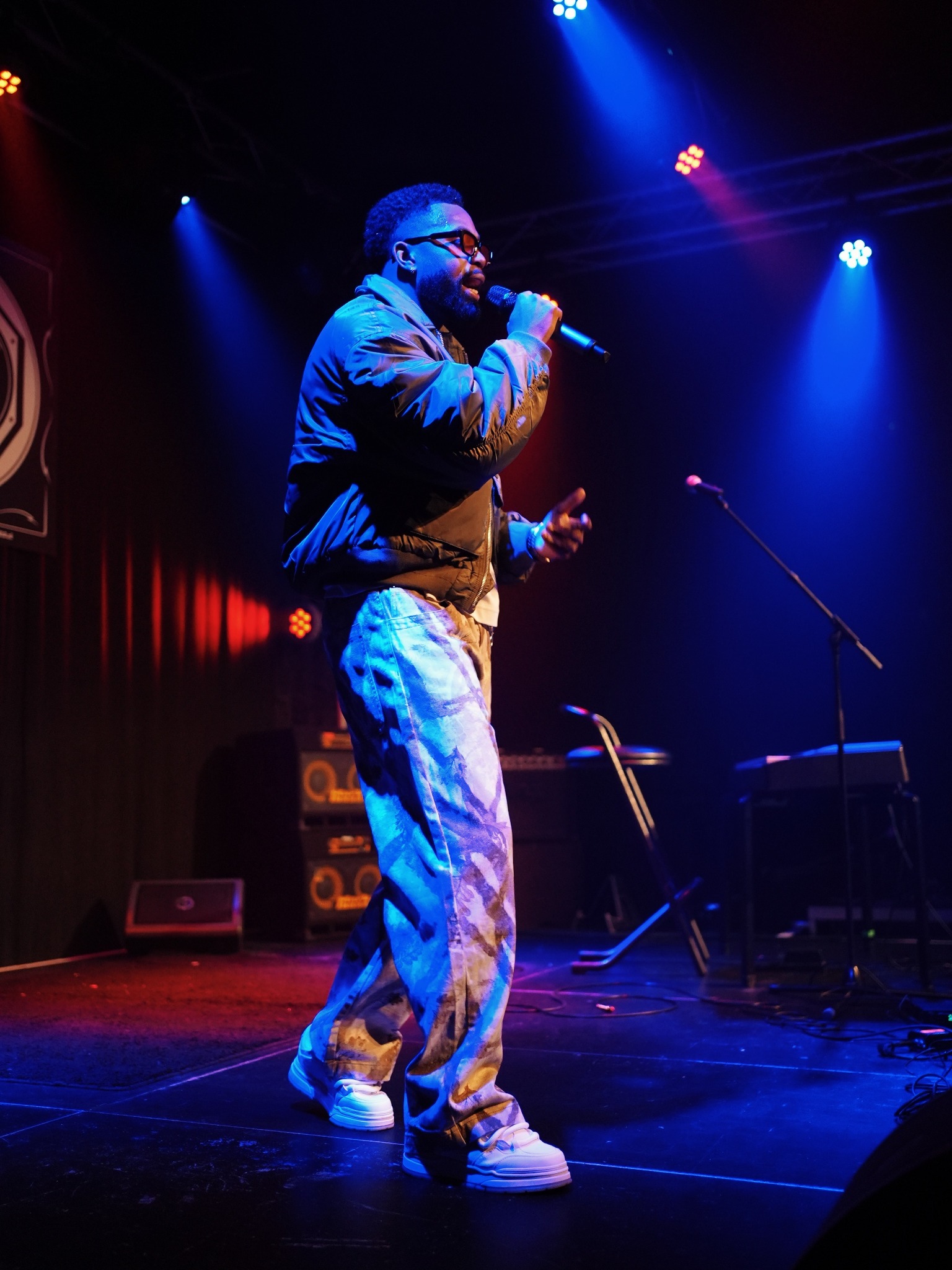 LORAYNN performing live with microphone
